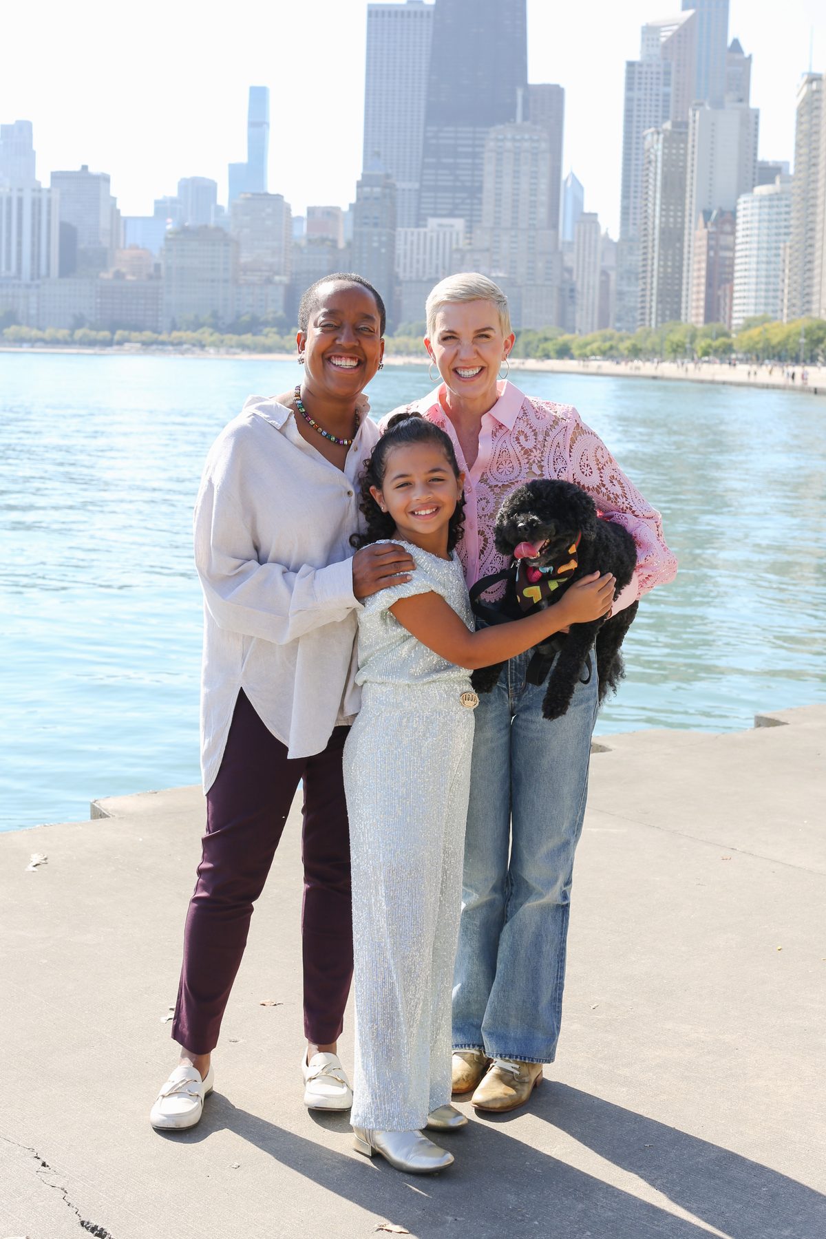 Lesley Pinckney with her wife Tiffany, daughter Penelope, and their dog Ziggy, on the Chicago lakefront